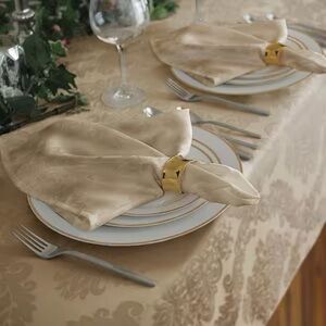 Elegant Tan Napkin Set with Gold Rings